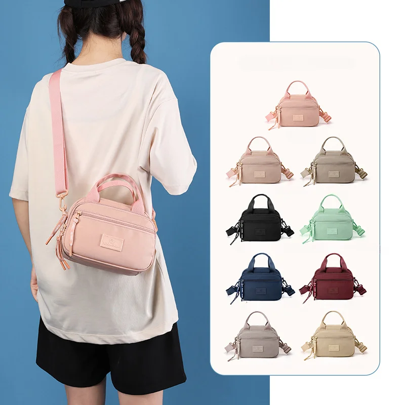 Fashion-Forward Wholesale Lightweight Water Repellent Nylon Messenger Bag Trendy Purses, Limited Offer Fashion-Forward Wholesale Lightweight Water Repellent Nylon Messenger Bag Trendy Purses, Limited Offer